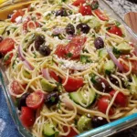Colorful California Spaghetti Salad with fresh vegetables and dressing
