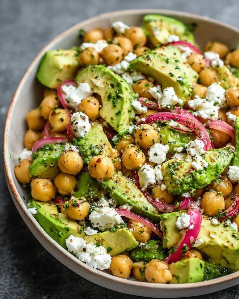Chickpea avocado salad with fresh ingredients in a bowl