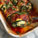Delicious Zucchini Rollatini filled with ricotta and baked in marinara sauce